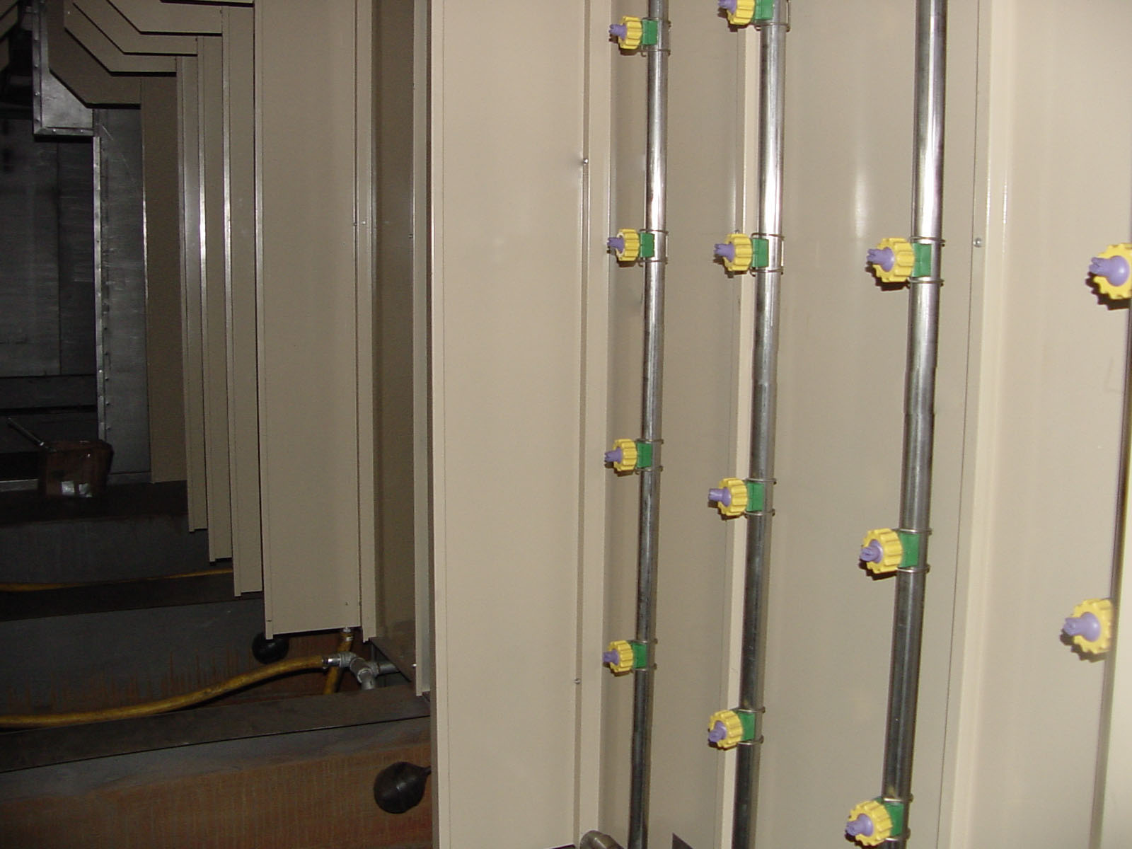 Modular multi-stage industrial washer with stainless steel risers